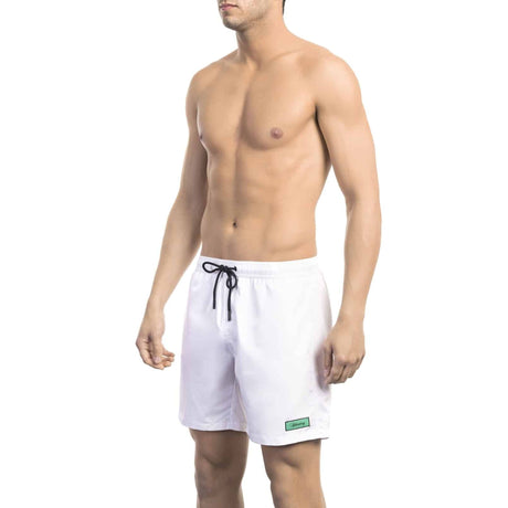 Men's swim shorts Spring/Summer collection Solid color swim shorts Polyester swim shorts Quick-drying swim shorts Elastic waistband swim shorts Pockets swim shorts Breathable swim shorts Visible logo