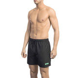 Men's swim shorts Spring/Summer collection Solid color swim shorts Polyester swim shorts Quick-drying swim shorts Elastic waistband swim shorts Pockets swim shorts Breathable swim shorts Visible logo